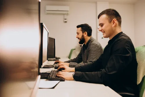 young-male-web-designers-working-computer